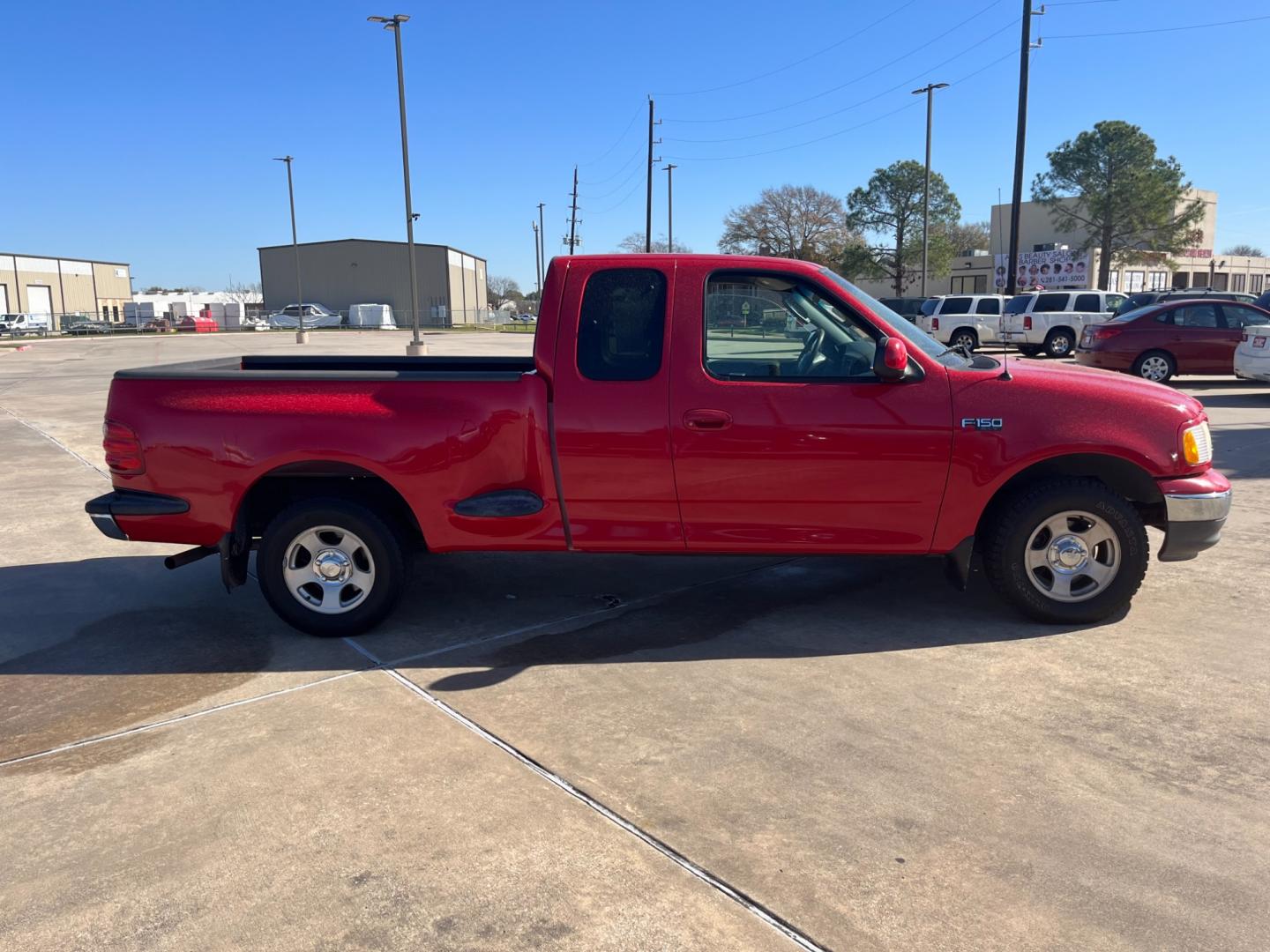 2003 red /TAN Ford F-150 XL SuperCab Flareside 2WD (1FTRX07213K) with an 4.2L V6 OHV 12V engine, Automatic transmission, located at 14700 Tomball Parkway 249, Houston, TX, 77086, (281) 444-2200, 29.928619, -95.504074 - Photo#7